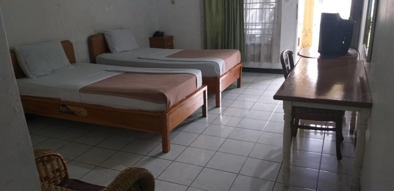 Intan Hotel ปูร์วาการ์ตา ภายนอก รูปภาพ