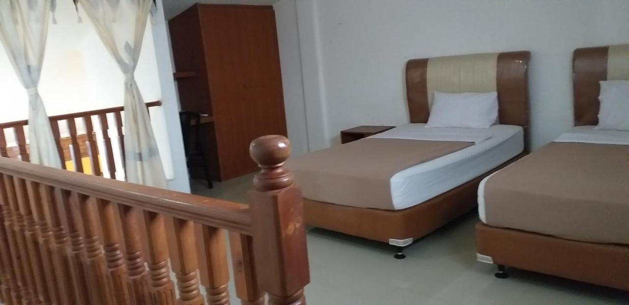 Intan Hotel ปูร์วาการ์ตา ภายนอก รูปภาพ
