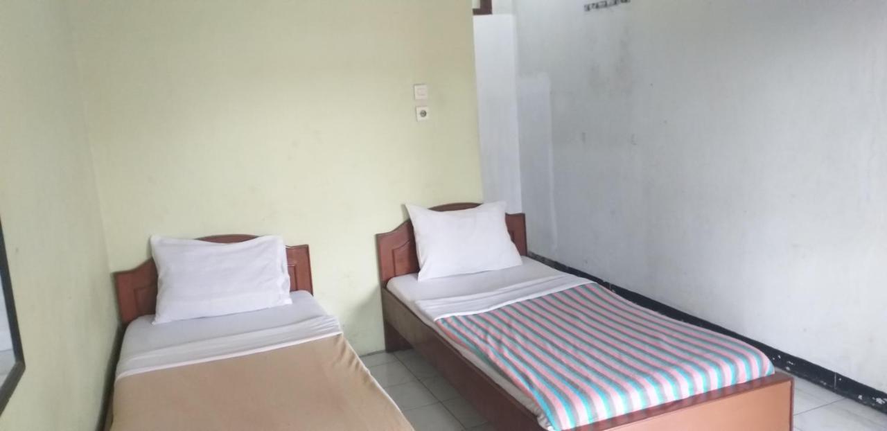 Intan Hotel ปูร์วาการ์ตา ภายนอก รูปภาพ