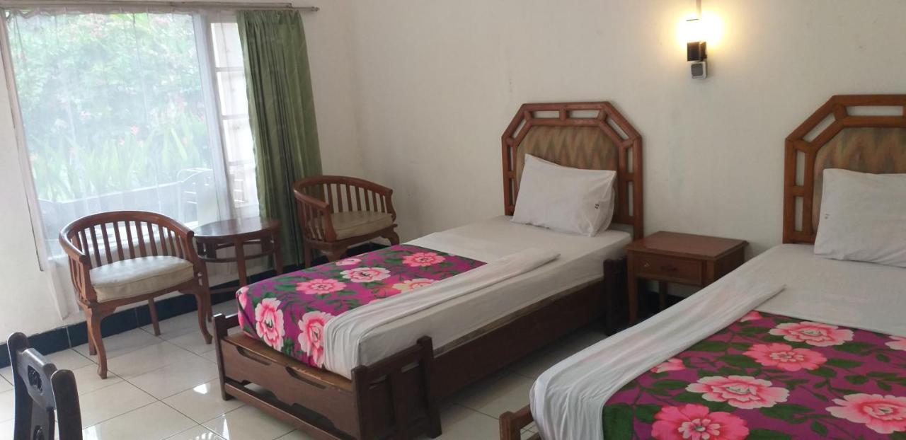 Intan Hotel ปูร์วาการ์ตา ภายนอก รูปภาพ