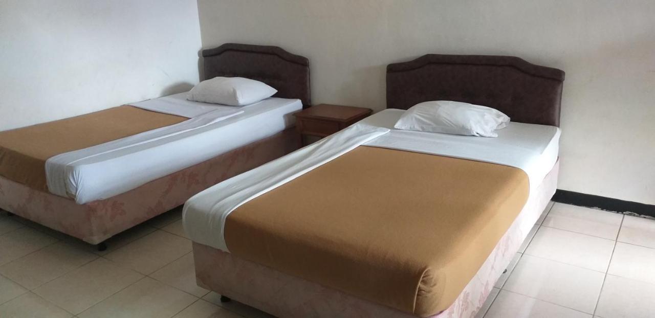 Intan Hotel ปูร์วาการ์ตา ภายนอก รูปภาพ