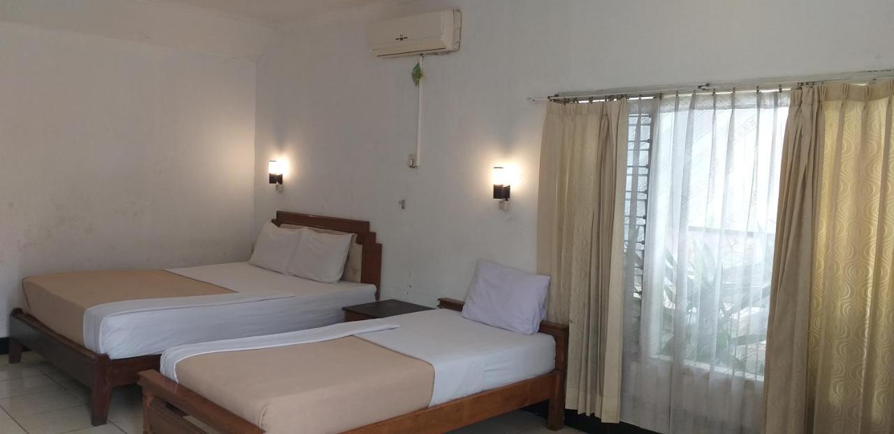 Intan Hotel ปูร์วาการ์ตา ภายนอก รูปภาพ