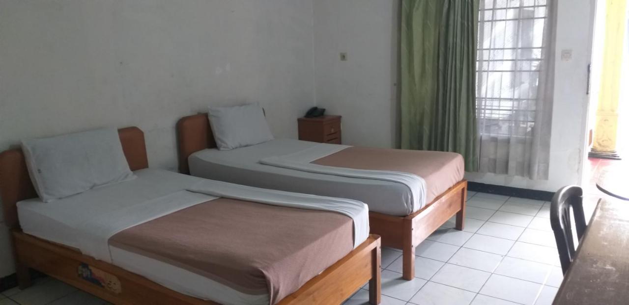 Intan Hotel ปูร์วาการ์ตา ภายนอก รูปภาพ