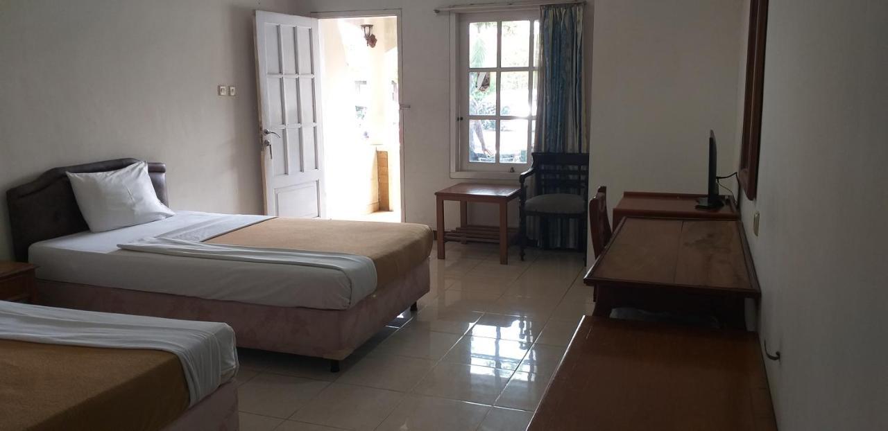 Intan Hotel ปูร์วาการ์ตา ภายนอก รูปภาพ