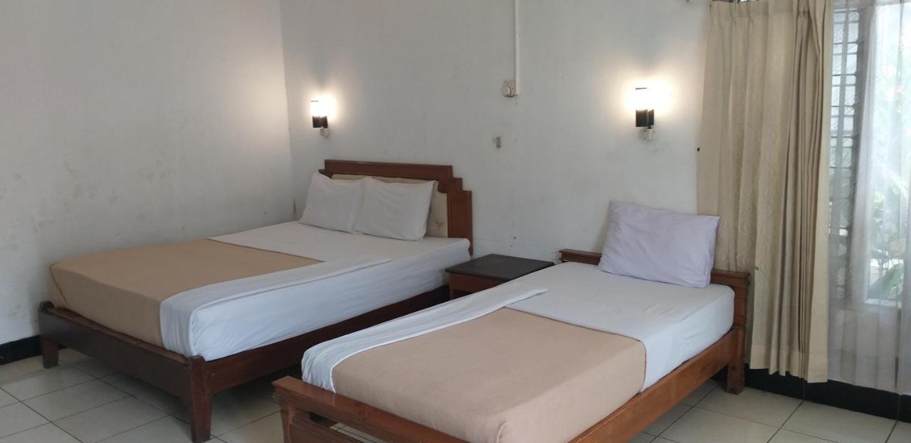 Intan Hotel ปูร์วาการ์ตา ภายนอก รูปภาพ