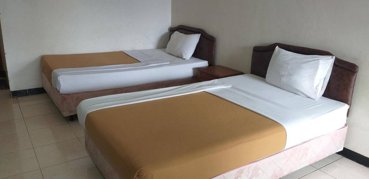 Intan Hotel ปูร์วาการ์ตา ภายนอก รูปภาพ