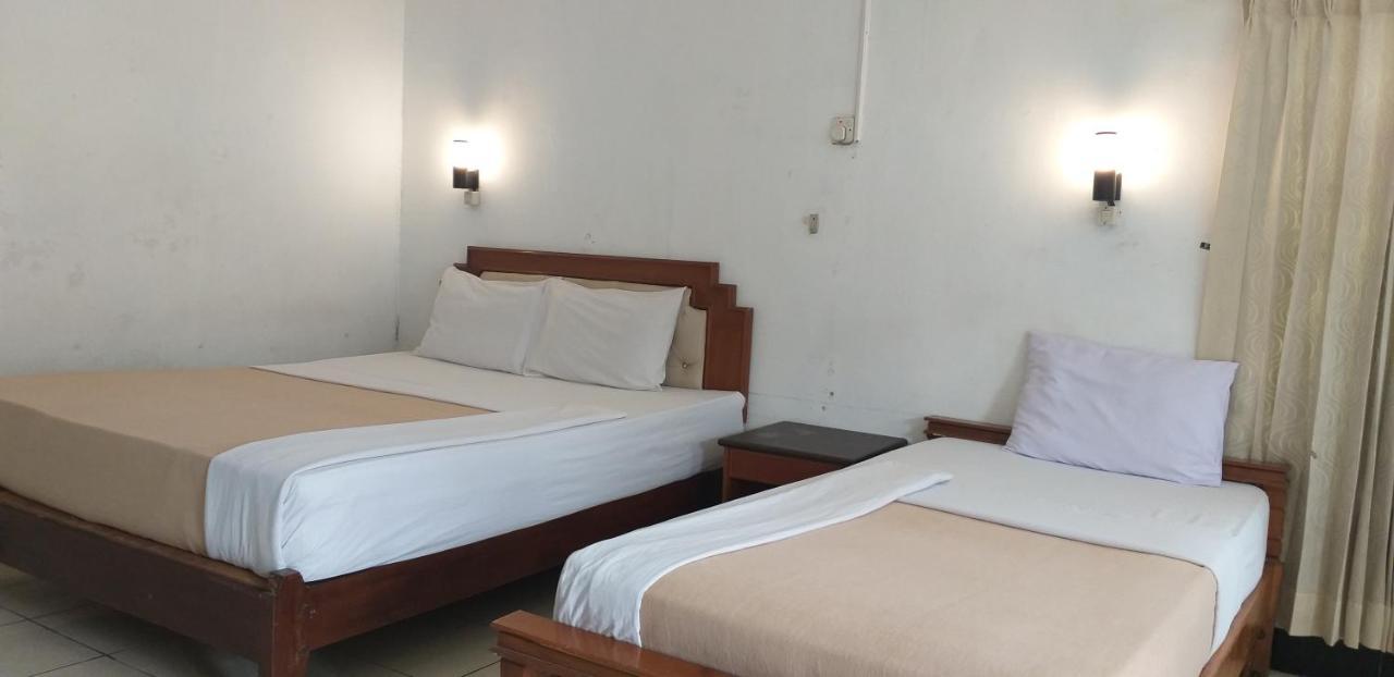 Intan Hotel ปูร์วาการ์ตา ภายนอก รูปภาพ