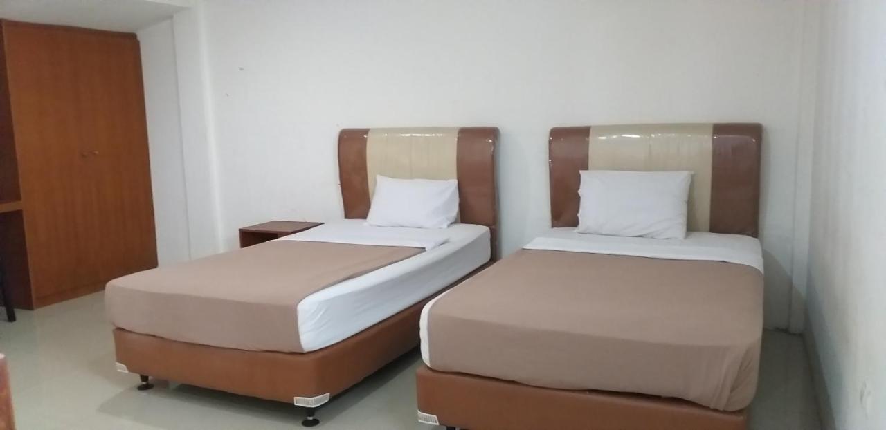 Intan Hotel ปูร์วาการ์ตา ภายนอก รูปภาพ