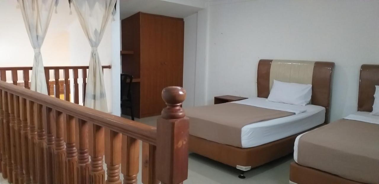 Intan Hotel ปูร์วาการ์ตา ภายนอก รูปภาพ